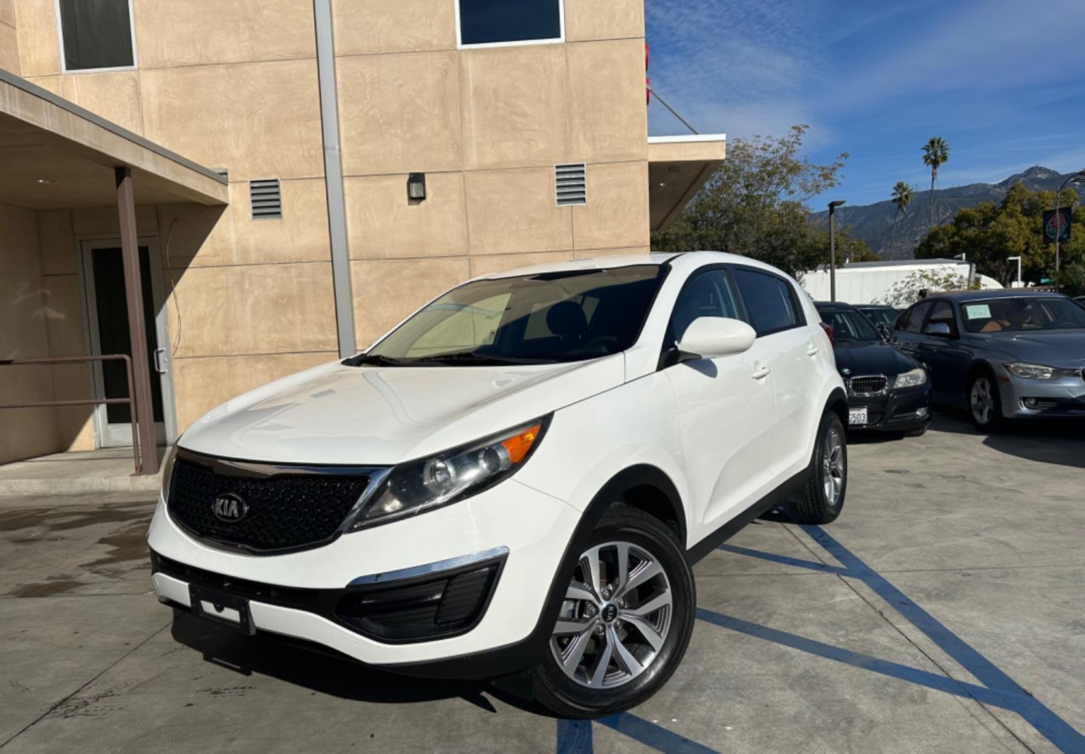 2015 WHITE /Black Kia Sportage (KNDPB3AC5F7) , located at 30 S. Berkeley Avenue, Pasadena, CA, 91107, (626) 248-7567, 34.145447, -118.109398 - rown City Motors is a used “Buy Here Pay Here” car dealer in Pasadena CA. “Buy Here Pay Here” financing, means that when you purchase your vehicle from our dealership, that you make the payments to the dealership as well. We do not need the banks approval to get you approved for a used auto - Photo#0